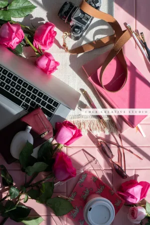 Pink Roses, Camera & Pink Notebook. Stock Photo