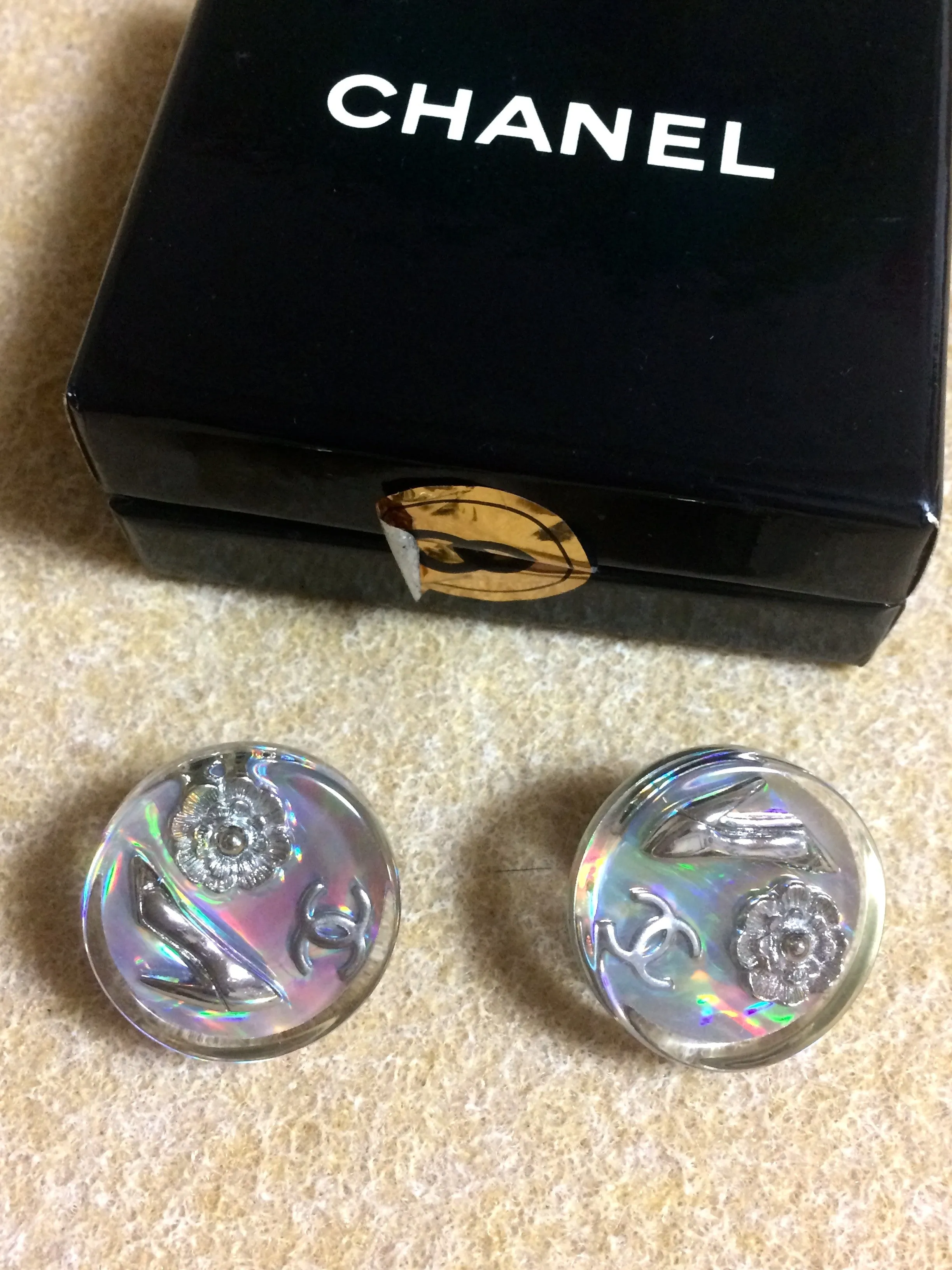 Vintage CHANEL silver tone and rainbow aurora shining earrings with Chanel iconic charms. Shoe, camellia, and CC mark in it. Perfect.