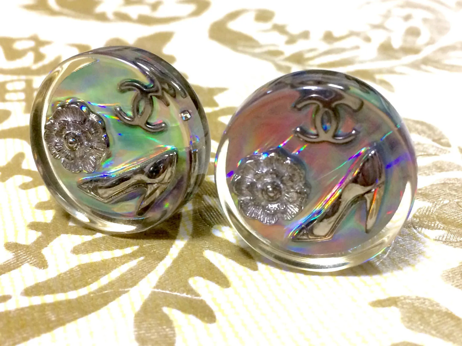 Vintage CHANEL silver tone and rainbow aurora shining earrings with Chanel iconic charms. Shoe, camellia, and CC mark in it. Perfect.